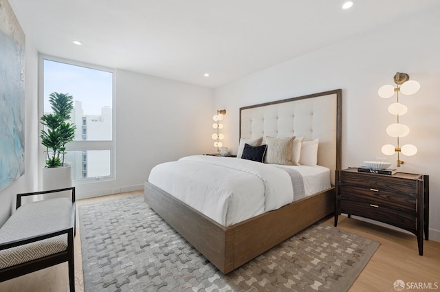 bedroom featuring light wood-type flooring