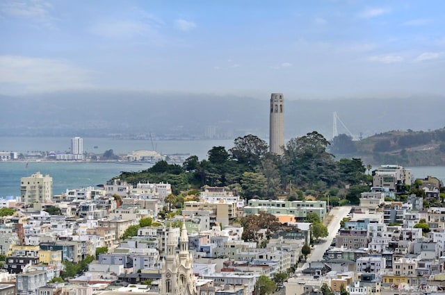 property's view of city featuring a water view