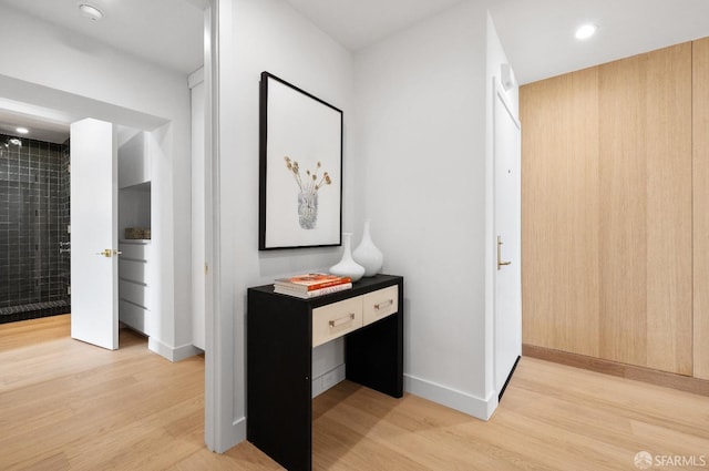 hallway featuring light hardwood / wood-style floors