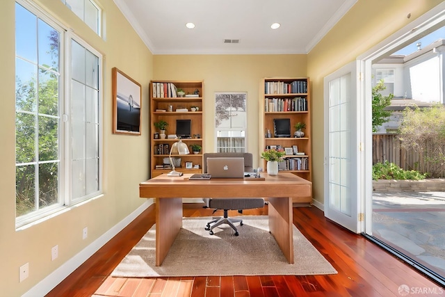 office area with wood-type flooring and ornamental molding