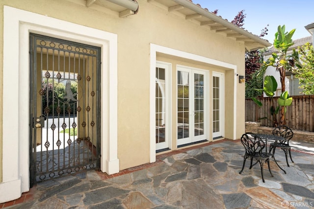 view of patio / terrace featuring french doors