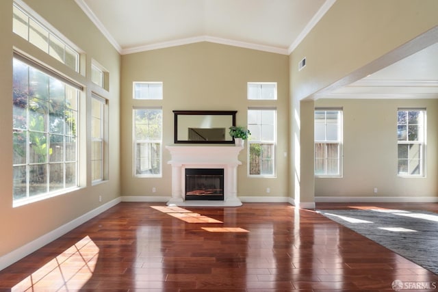 unfurnished living room with ornamental molding, dark hardwood / wood-style flooring, and lofted ceiling