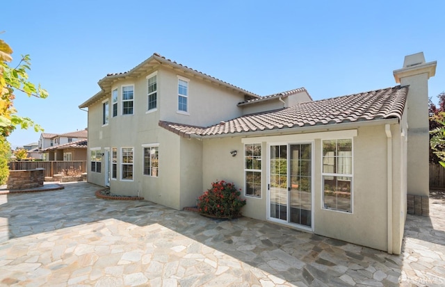 rear view of property with a patio