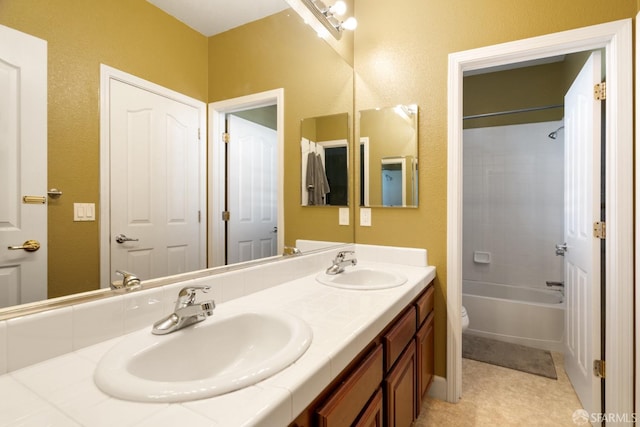 full bathroom with tile patterned floors, vanity, toilet, and tub / shower combination