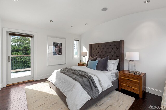 bedroom featuring access to outside, hardwood / wood-style floors, recessed lighting, and baseboards