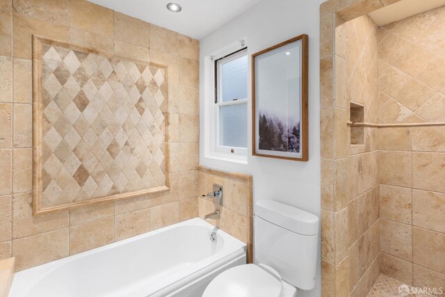 bathroom with a garden tub, toilet, and recessed lighting