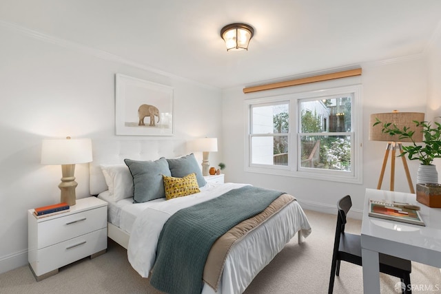 bedroom featuring carpet, baseboards, and crown molding