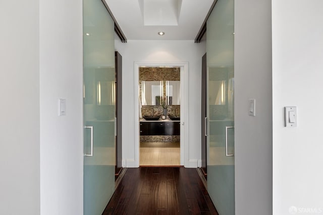 hall featuring dark wood-type flooring