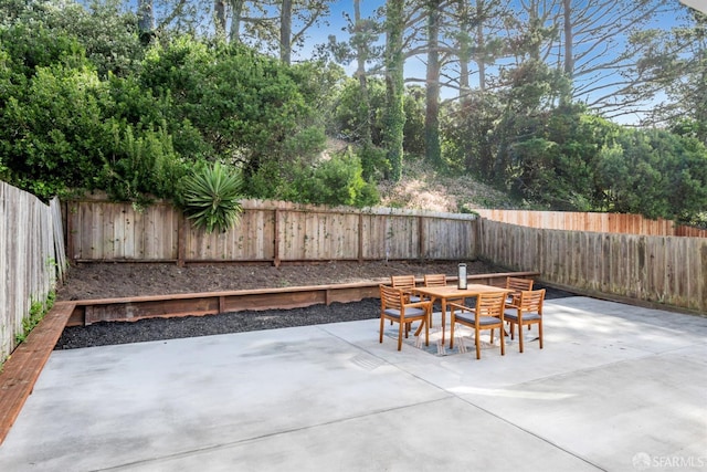 view of patio / terrace featuring outdoor dining space and a fenced backyard