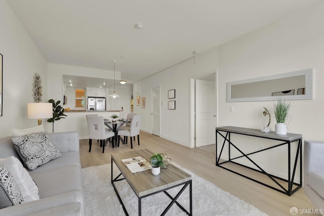 living room with light wood-style floors