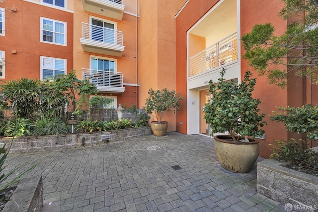 exterior space with stucco siding