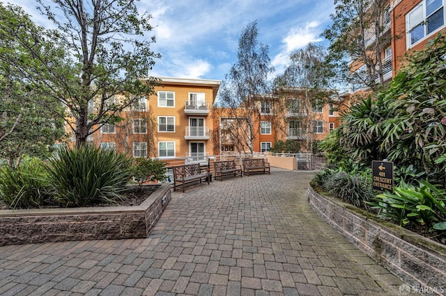 view of property's community with a patio