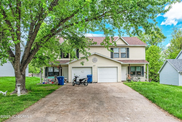 traditional-style home featuring covered porch, an attached garage, driveway, a front yard, and a shingled roof