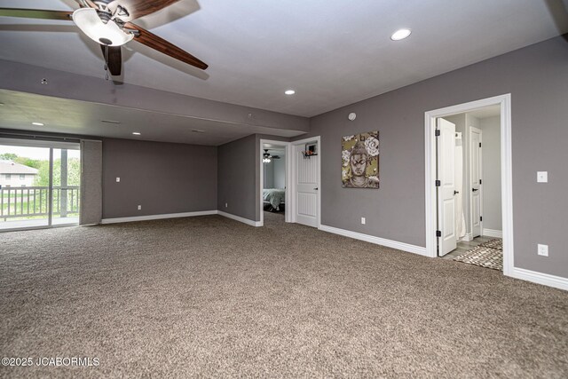 spare room with recessed lighting, carpet floors, a ceiling fan, and baseboards