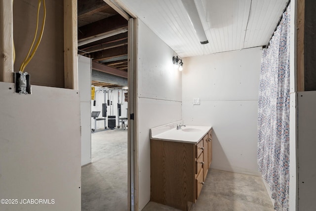 bathroom with concrete flooring and vanity