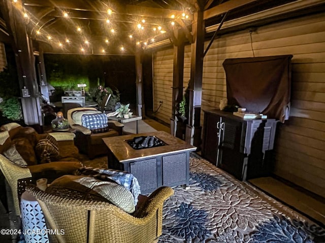 view of patio / terrace featuring an outdoor living space with a fire pit