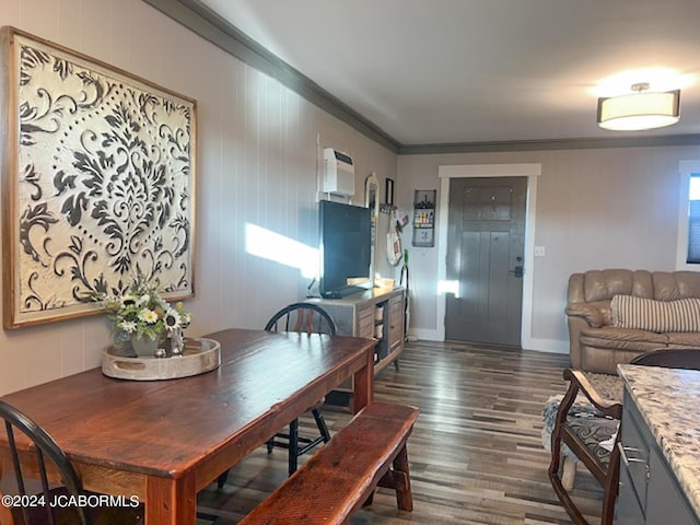 dining area with dark hardwood / wood-style flooring and ornamental molding