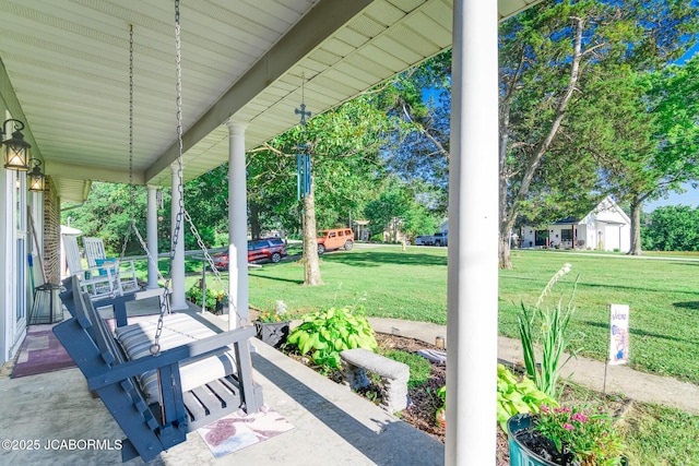 4758 Henwick Ln, Jefferson City, MO 65109 - covered porch featuring a yard