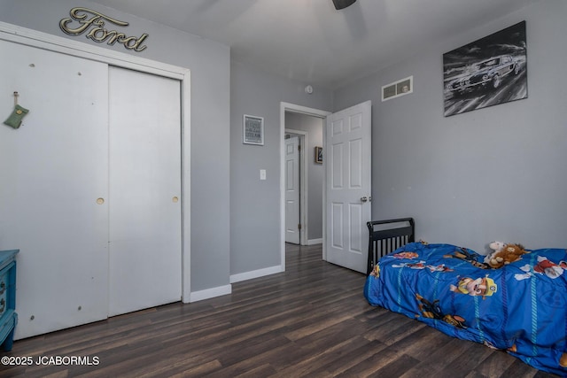 4758 Henwick Ln, Jefferson City, MO 65109 - unfurnished bedroom featuring wood finished floors, a ceiling fan, and a closet