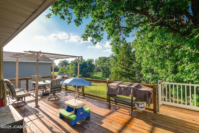 4758 Henwick Ln, Jefferson City, MO 65109 - wooden deck featuring a pergola, outdoor dining area, and a grill