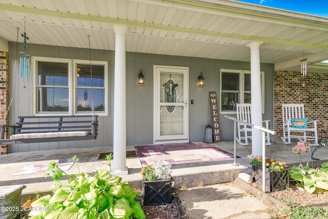 4758 Henwick Ln, Jefferson City, MO 65109 - view of exterior entry with a porch