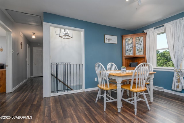 4758 Henwick Ln, Jefferson City, MO 65109 - dining room featuring wood finished floors and a chandelier