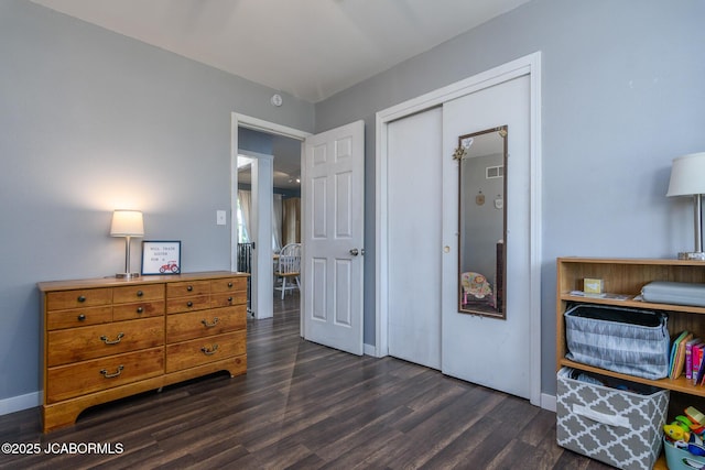 4758 Henwick Ln, Jefferson City, MO 65109 - bedroom featuring dark wood-type flooring and a closet