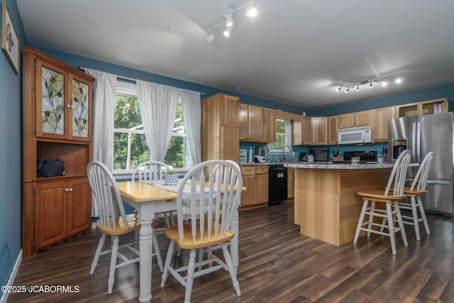 4758 Henwick Ln, Jefferson City, MO 65109 - kitchen with white microwave, stainless steel fridge with ice dispenser, track lighting, black dishwasher, and dark wood-style floors