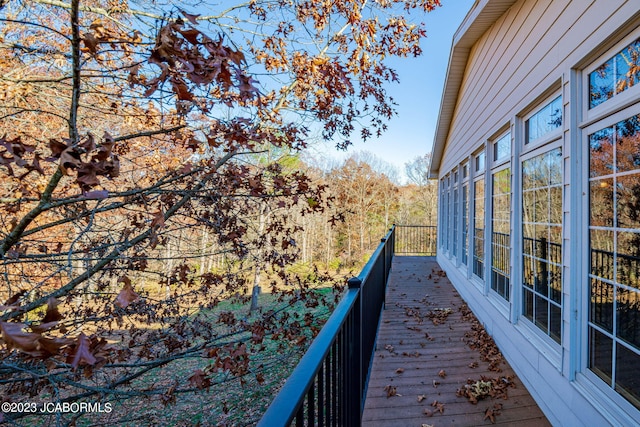 wooden balcony featuring a deck