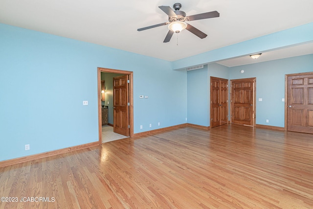 unfurnished room with light hardwood / wood-style floors and ceiling fan