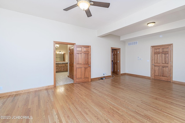 unfurnished room with ceiling fan and light hardwood / wood-style flooring