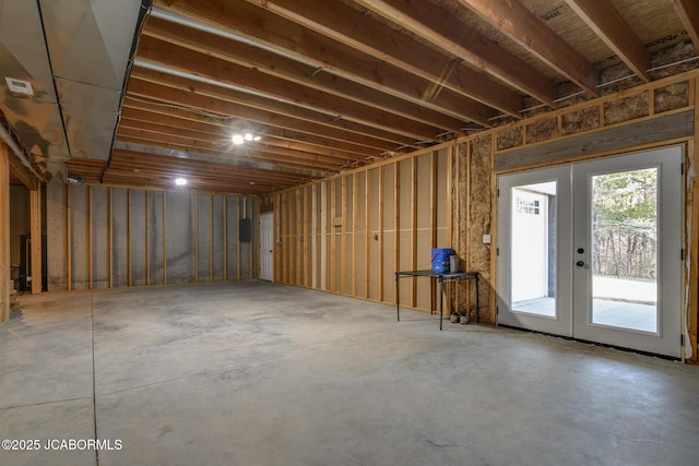 below grade area featuring french doors