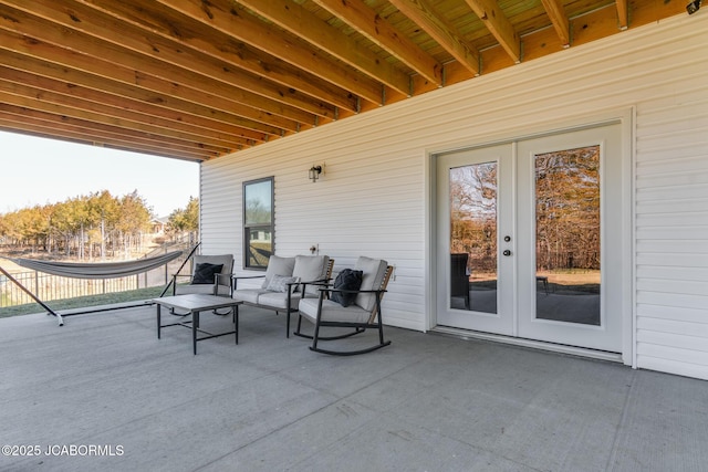 view of patio featuring french doors