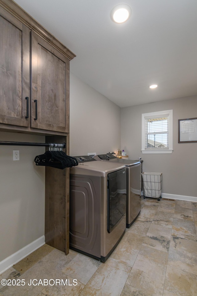 laundry room with cabinet space, baseboards, separate washer and dryer, and recessed lighting