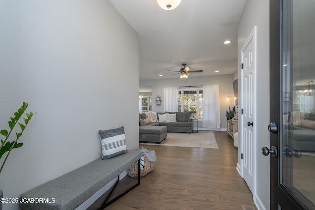 entrance foyer featuring baseboards, wood finished floors, and recessed lighting