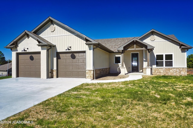 modern farmhouse style home featuring a front lawn and a garage