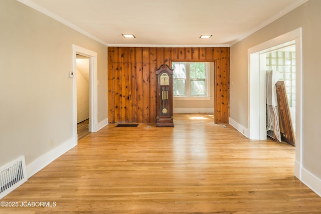 1811 W Main St, Jefferson City, MO 65109 - empty room featuring ornamental molding and light wood-style floors