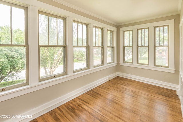1811 W Main St, Jefferson City, MO 65109 - unfurnished sunroom with crown molding and wood finished floors