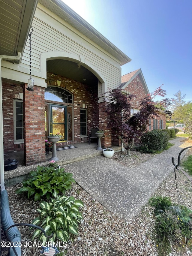 view of patio featuring a porch