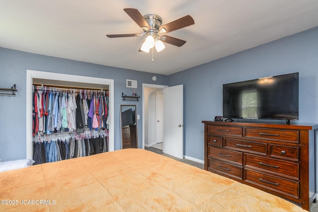 202 S Fourth St, Linn, MO 65051 - carpeted bedroom with ceiling fan, a closet, baseboards, and visible vents