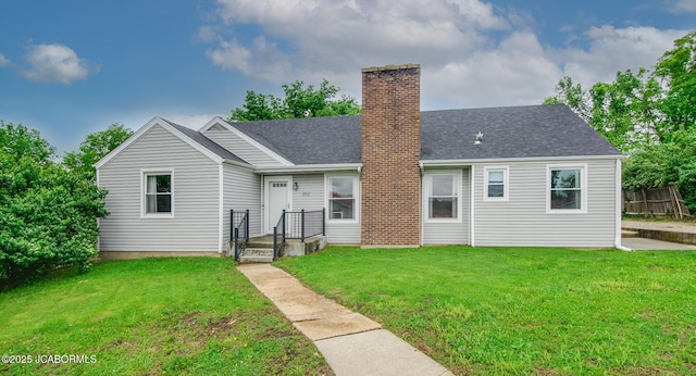 202 S Fourth St, Linn, MO 65051 - rear view of house with a yard, fence, roof with shingles, and a chimney