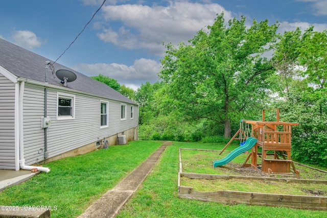 202 S Fourth St, Linn, MO 65051 - view of yard with central AC and a playground