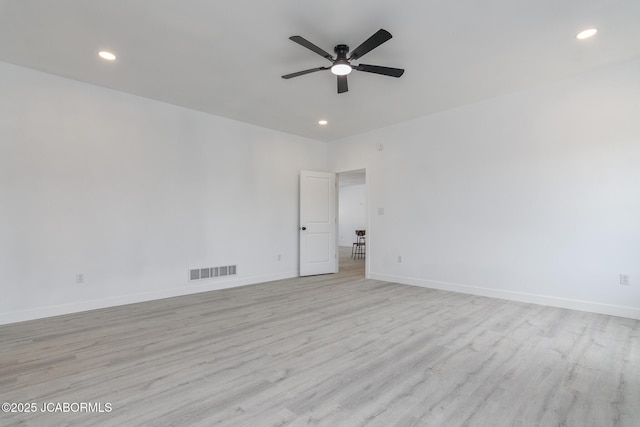 8206 Big Meadows Rd, Jefferson City, MO 65101 - spare room featuring light wood-style flooring, a ceiling fan, recessed lighting, and baseboards