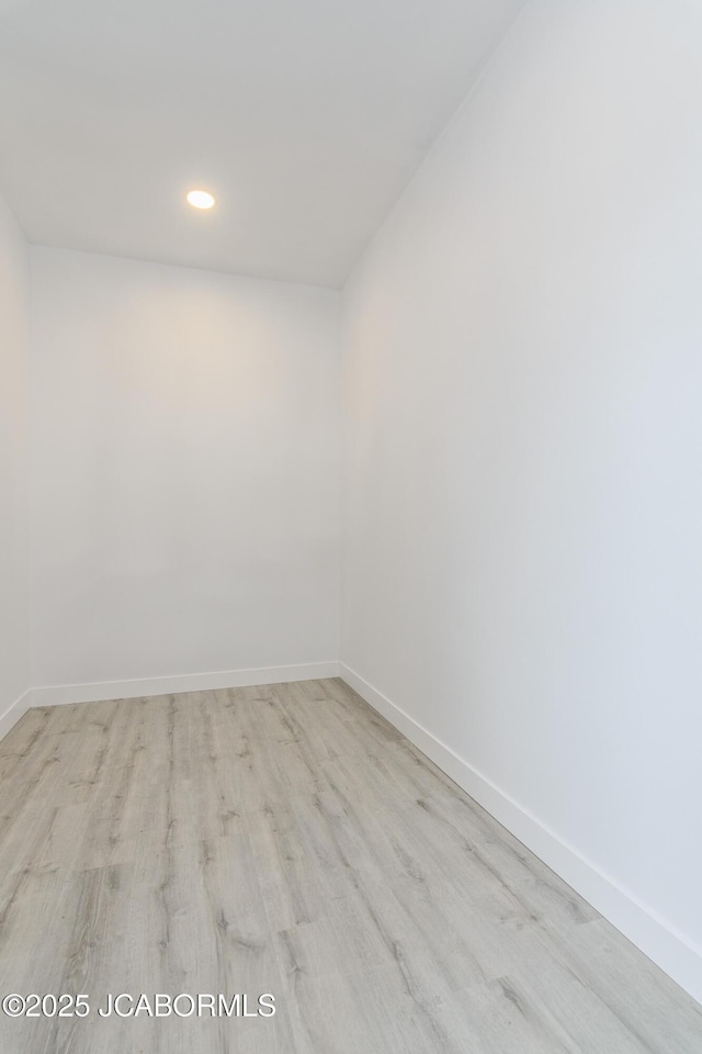 8206 Big Meadows Rd, Jefferson City, MO 65101 - empty room featuring baseboards, wood finished floors, and recessed lighting