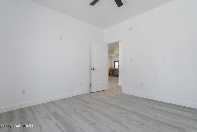 8206 Big Meadows Rd, Jefferson City, MO 65101 - unfurnished room featuring ceiling fan, light wood-style flooring, and baseboards