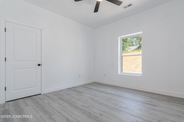 8206 Big Meadows Rd, Jefferson City, MO 65101 - unfurnished room with a ceiling fan, light wood-type flooring, and baseboards