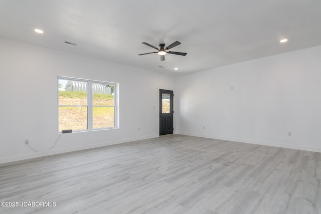 8206 Big Meadows Rd, Jefferson City, MO 65101 - spare room with a ceiling fan, light wood-style floors, recessed lighting, and baseboards