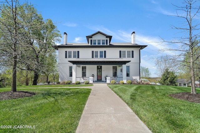 view of front of home featuring a porch and a front yard