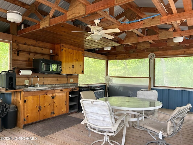 6640 Doe Vw, Steedman, MO 65077 - sunroom with a sink, a ceiling fan, outdoor dining area, and lofted ceiling