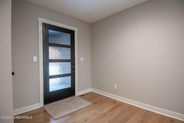 entrance foyer with light wood-type flooring